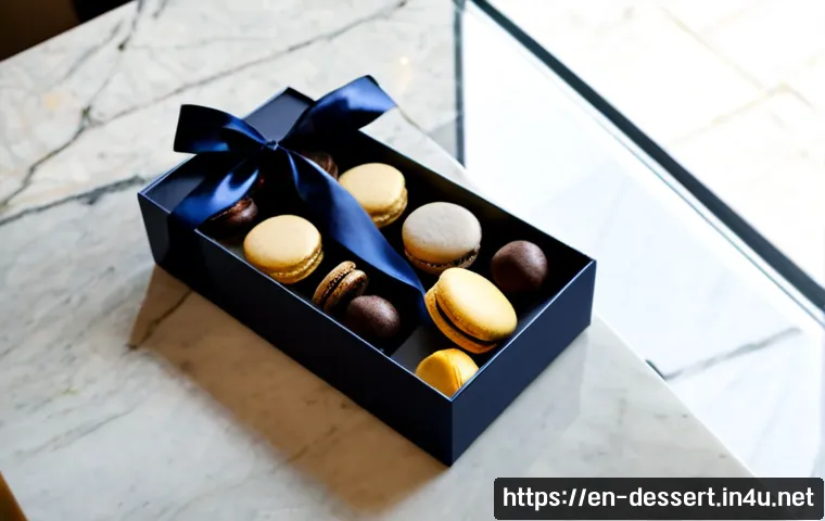 Home 17 프리미엄 디저트 상자 - Photorealistic premium dessert gift box opened on a polished marble table, neatly arranged artisanal...